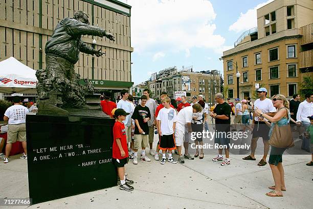 Statue of Harry Caray stands outside Wrigley Field during the game between the Cincinnati Reds and the Chicago Cubs in Chicago, Illinois on May 29,...