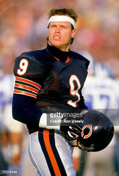 Quarterback Jim McMahon of the Chicago Bears stands on the sideline with his helmet off during the game against the Detroit Lions at Soldier Field on...