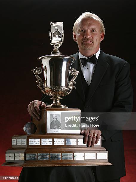 Head coach Lindy Ruff of the Buffalo Sabres poses with the Jack Adams Award backstage at the the NHL TV Awards Show at the Westin Grand on June 22,...