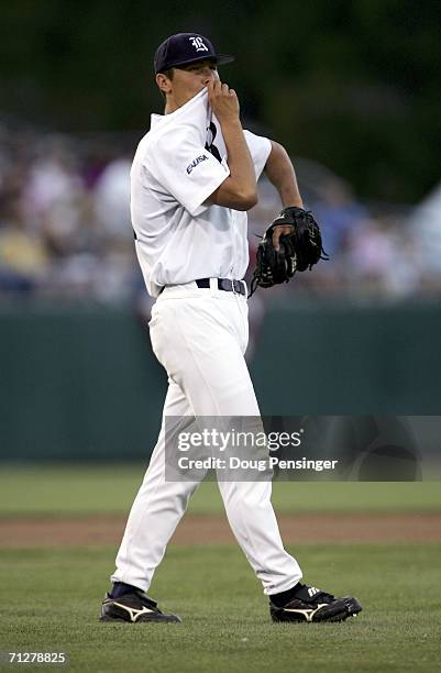 Starting pitcher Eddie Degerman of the Rice Owls reacts after giving up a 2-0 lead and being pulled from the game in the fifth inning against the...