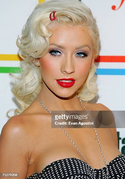 Singer Christina Aguilera arrives at Entertainment Weekly's "Must List" party at Buddha Bar June 22, 2006 in New York City.