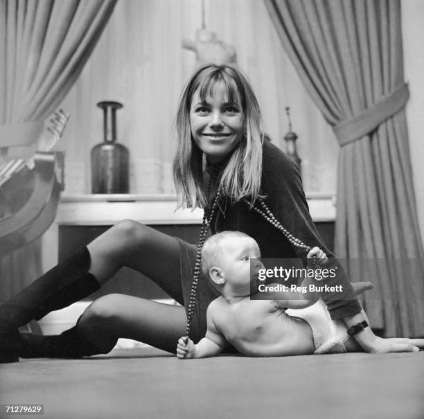 English actress and singer Jane Birkin with 7-month-old Kate Barry, her daughter by composer John Barry, 9th November 1967.