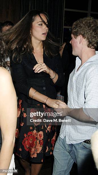 Kate Middleton and Guy Pelly dance at the Sony Ericsson WTA Tour's pre-Wimbledon party hosted by Sir Richard Branson of Virgin, at The Roof Gardens...