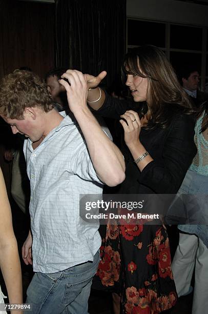 Kate Middleton and Guy Pelly dance at the Sony Ericsson WTA Tour's pre-Wimbledon party hosted by Sir Richard Branson of Virgin, at The Roof Gardens...