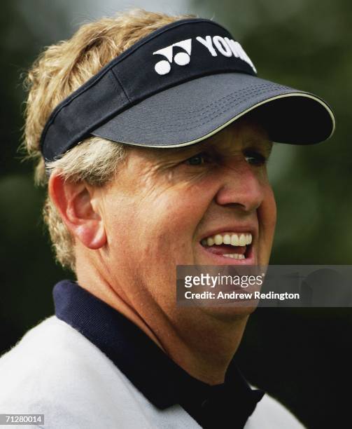Colin Montgomerie of Scotland watches his tee-shot on the 11th hole during the second round of The Johnnie Walker Championship on The PGA Centenary...