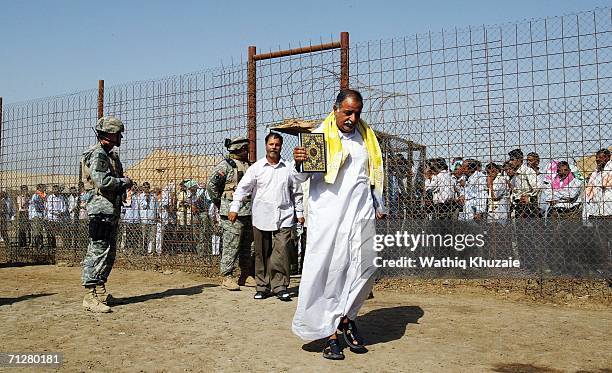 Iraqi freed prisoners leave June 23, 2006 from Abu Ghraib prison west of Baghdad, Iraq. More than 500 Iraqi detainees were released from Abu Ghraib...