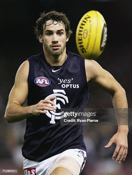 Andrew Walker of the Blues in action during the round twelve AFL match between the Kangaroos and Carlton Blues at the Telstra Dome June 23, 2006 in...