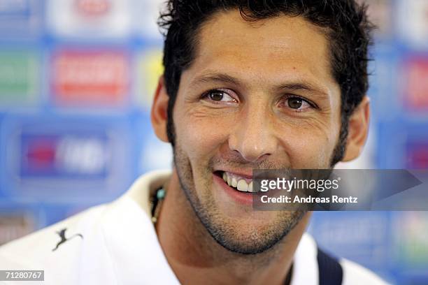 Marco Materazzi smiles during an Italy National Football team press conference on June 23, 2006 in Duisburg, Germany.