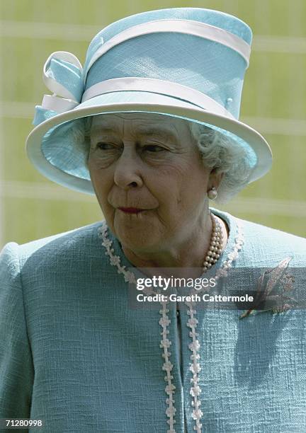 Queen Elizabeth II arrives by carriage for the fourth day of Royal Ascot at the Ascot Racecourse on June 23, 2006 in Berkshire, England. The event...