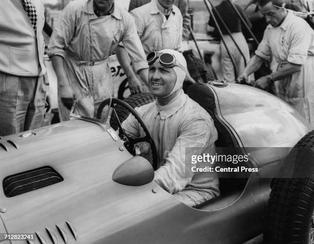 Racing driver Louis Chiron of Monaco sits aboard the Ecurie France Talbot-Lago T26C before the start of the RAC International Grand Prix on 2 October...