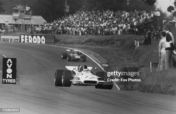 Andrea de Adamich of Italy drives the Surtees TS5 Chevrolet Formula 5000 through Deer Leap during the Guards International Gold Cup for Formula One,...