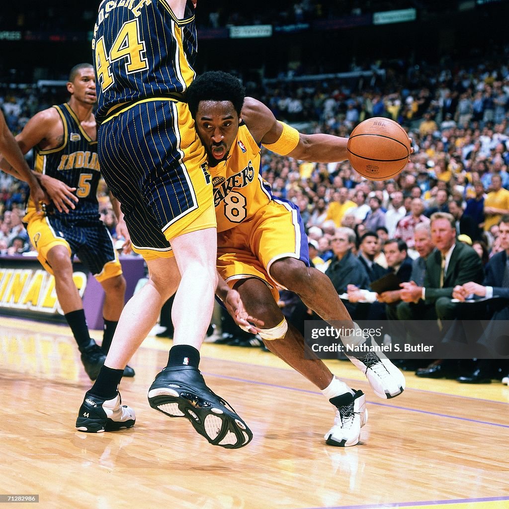 Kobe Bryant Of The Los Angeles Lakers Drives To The Basket Against kobe-bryant-of-the-los-angeles-lakers-drives-to-the-basket-against