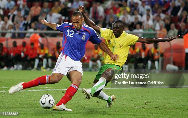 Thierry Henry of France shoots and scores the second goal of the game during the FIFA World Cup Germany 2006 Group G match between Togo and France at...