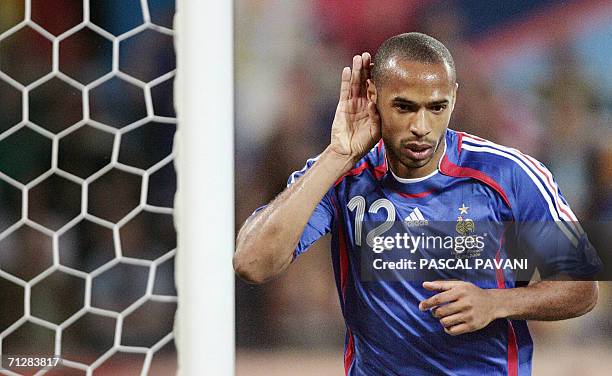 French forward Thierry Henry reacts after scoring during the World Cup 2006 group G football match Togo vs France, 23 June 2006 at Cologne stadium....