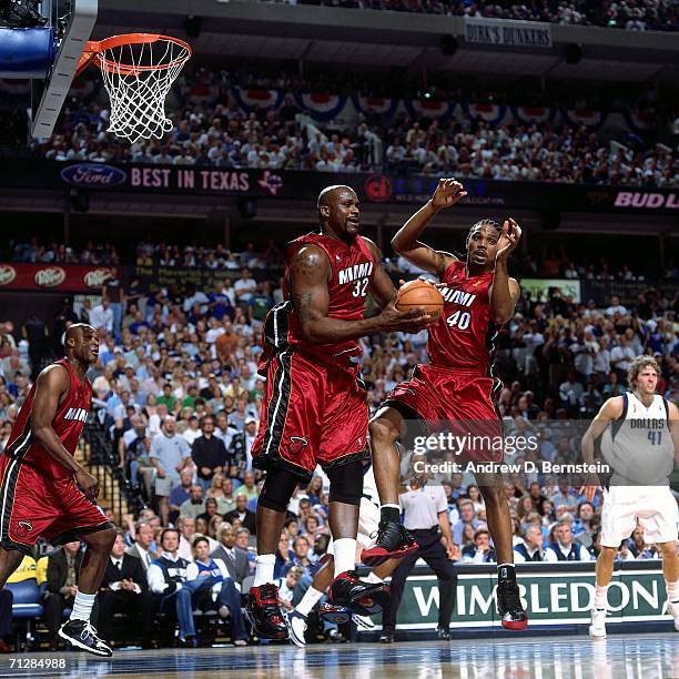 Shaquille O'Neal of the Miami Heat grabs a rebound against the Dallas Mavericks during Game Six of the 2006 NBA Finals played June 20, 2006 at the...