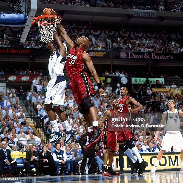 Alonzo Mourning of the Miami Heat rejects a shot attempt by Josh Howard of the Dallas Mavericks during Game Six of the 2006 NBA Finals played June...