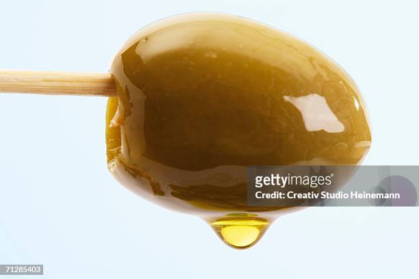 green olive on skewer - olive fruit stock pictures, royalty-free photos & images