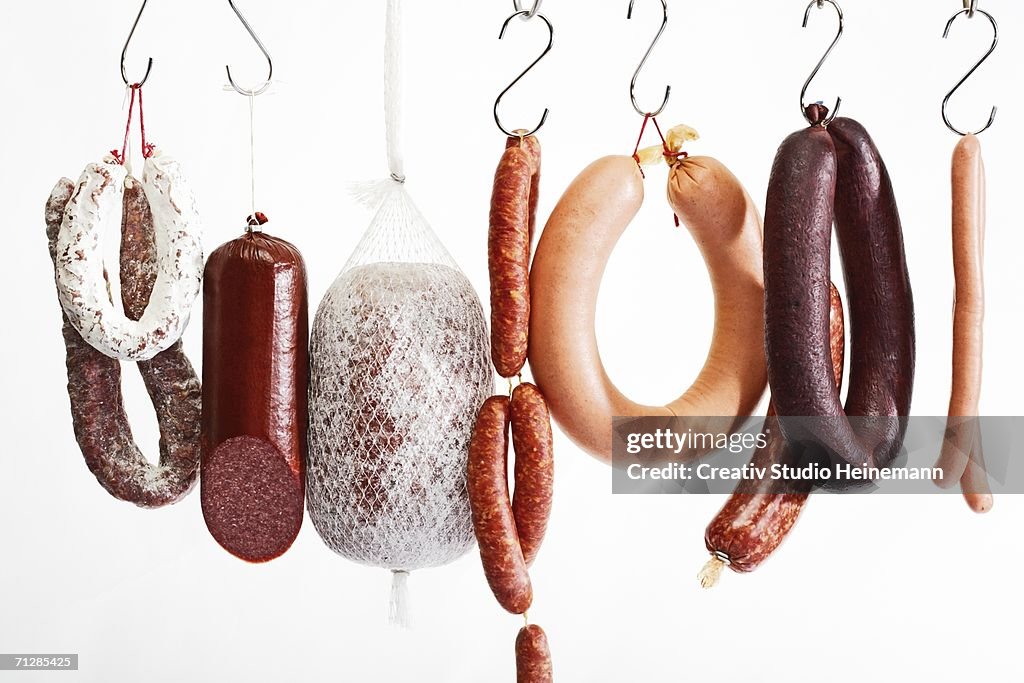 Sausages hanging on hooks