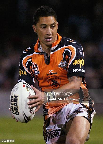 Benji Marshall of the West Tigers looks to pass during the round 16 NRL match between the Penrith Panthers and the Wests Tigers at CUA Stadium June...