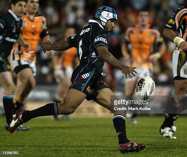 Preston Campbell of the Panthers puts in a kick during the round 16 NRL match between the Penrith Panthers and the Wests Tigers at CUA Stadium June...