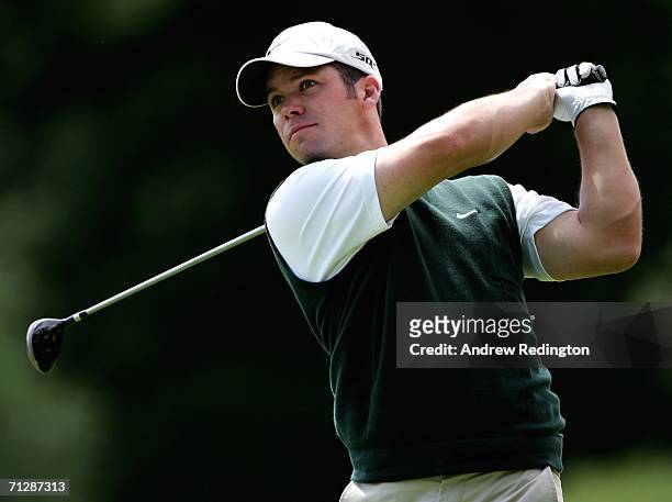 Paul Casey of England tees off on the seventh hole during the third round of The Johnnie Walker Championship on The PGA Centenary Course at...