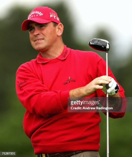 Thomas Bjorn of Denmark tees off on the second hole during the third round of The Johnnie Walker Championship on The PGA Centenary Course at...