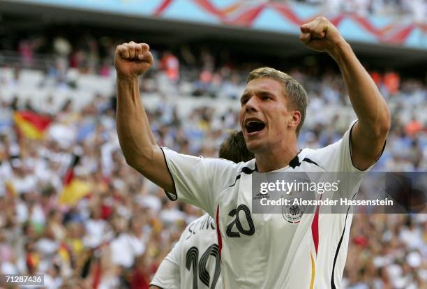 Lucas Podolski of Germany celebrates, after scoring the opening goal during the FIFA World Cup Germany 2006 Round of 16 match between Germany and...
