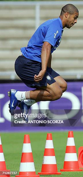 Brazilian striker Adriano jumps, 24 June 2006, during a training session at the Belkaw Arena in Bergish Gladbach, Germany ahead of their match...