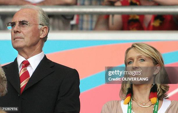 Franz Beckenbauer , chief of the World Cup Organising Committee and former German football great, and his new wife Heidrun Burmester attend the round...