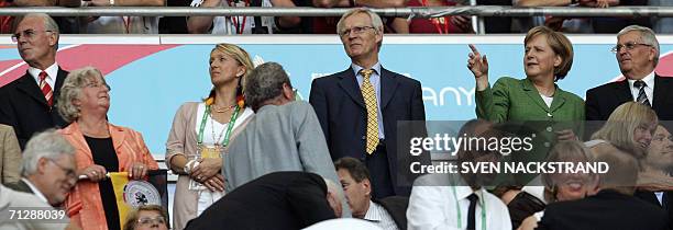 Sweden's Sports Minister Bosse Ringholm watches the action with German Chancellor Angela Merkel , German President Horst Koehler , Franz Beckenbauer...