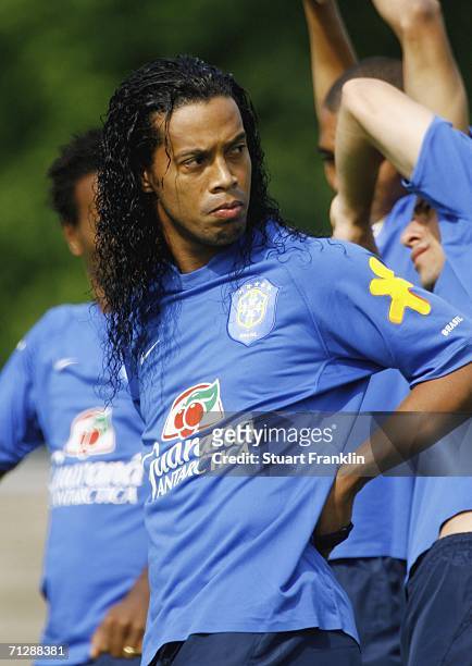 Ronaldinho of Brazil does some stretching excercises during the Brazil National Football Team training session for the FIFA World Cup Germany 2006 at...