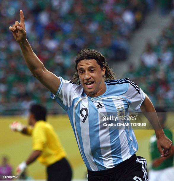 Argentinian forward Hernan Crespo celebrates after Mexican forward Jared Borgetti scored an own goal during the World Cup 2006 round of 16 football...