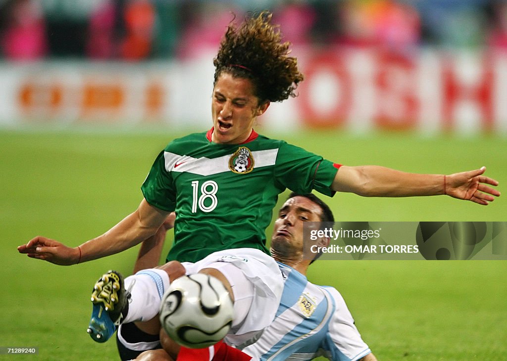 Mexican defender Andres Guardado (L) is