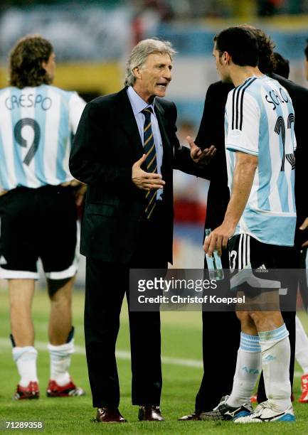 Manager of Argentina Jose Pekerman talks tactics with Lionel Scaloni during the FIFA World Cup Germany 2006 Round of 16 match between Argentina and...
