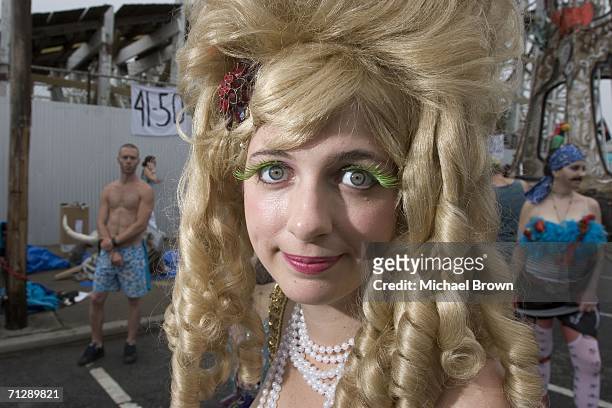 Participant poses during the 2006 Mermaid Parade, the nation's largest art parade, June 24, 2006 on Coney Island in the Brooklyn borough of New York...