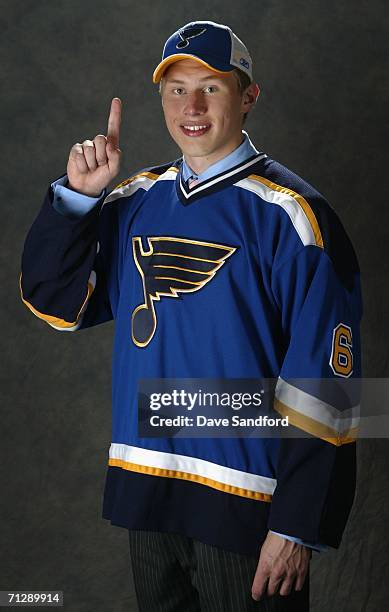 First overall pick Erik Johnson of the St. Louis Blues poses for a portrait backstage during the 2006 NHL Draft held at General Motors Place on June...