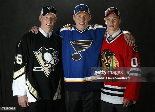 Second overall pick Jordan Staal of the Pittsburgh Penguins, first overall pick Erik Johnson of the St. Louis Blues, and third overall pick Jonathan...