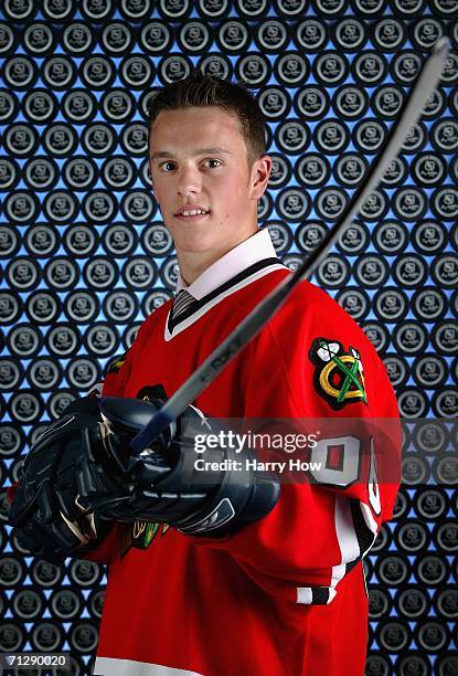 Third overall pick Jonathan Toews of the Chicago Blackhawks poses for a portrait backstage during the 2006 NHL Draft held at General Motors Place on...