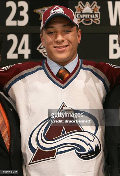 18th overall pick Chris Stewart of the Colorado Avalanche poses on stage during the 2006 NHL Draft held at General Motors Place on June 24, 2006 in...