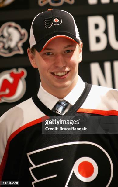 22nd overall pick Claude Giroux of the Philadelphia Flyers poses on stage during the 2006 NHL Draft held at General Motors Place on June 24, 2006 in...