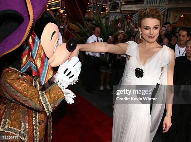 Actress Keira Knightley poses with Mickey Mouse at the world premiere of "Pirates of the Caribbean 2: Dead Man's Chest" held at Disneyland on June...