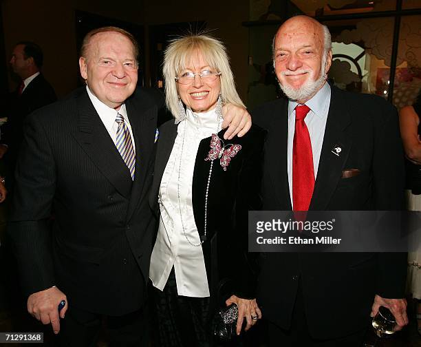 Chairman of Las Vegas Sands Corp., Sheldon Adelson, his wife Dr. Miriam Adelson and director Harold Prince, pose at a pre-show reception on the...