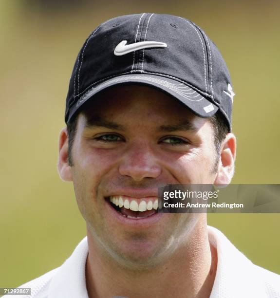 Paul Casey of England smiles after winning The Johnnie Walker Championship on The PGA Centenary Course at Gleneagles on June 25, 2006 in Gleneagles,...
