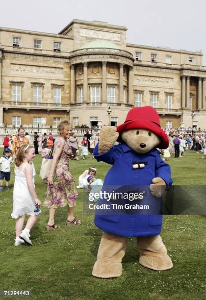 Paddington Bear waves at the Children's Party at the Palace, a children's literacy garden party hosted by the Queen to celebrate her 80th birthday at...