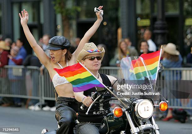 Members of the motorcycle group "Dykes on Bikes" ride during the 36th annual LGBT Pride Parade June 25, 2006 in San Francisco. Hundreds of thousands...