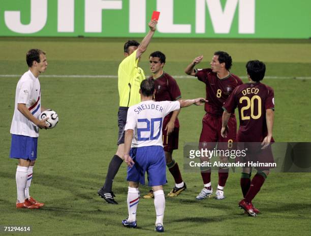 Deco of Portugal is shown the red card by Referee Valentin Ivanov of Russia, after his second bookable offence during the FIFA World Cup Germany 2006...