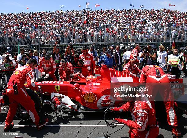 Michael Schumacher of Germany and Ferrari takes his position on the starting grid prior to the Canadian Formula One Grand Prix at the...