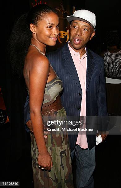 Actress Joy Bryant and music producer Russell Simmons arrive at the 3rd Annual Work Hard, Play Harder Lounge at the W Hotel on June 25, 2006 in Los...