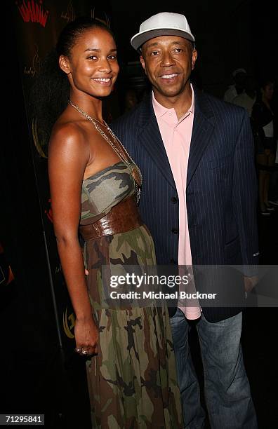 Actress Joy Bryant and music producer Russell Simmons arrive at the 3rd Annual Work Hard, Play Harder Lounge at the W Hotel on June 25, 2006 in Los...