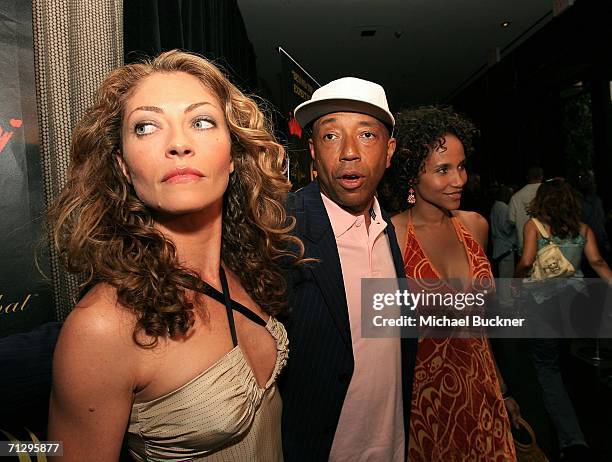 Actress Rebecca Gayheart, music producer Russell Simmons and actress Yvonne Wright arrive at the 3rd Annual Work Hard, Play Harder Lounge at the W...